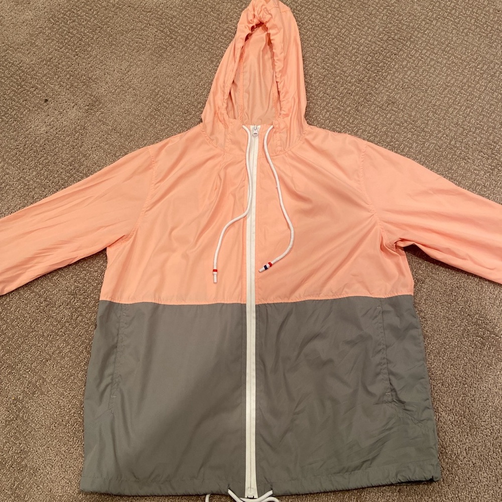 pink and gray windbreaker